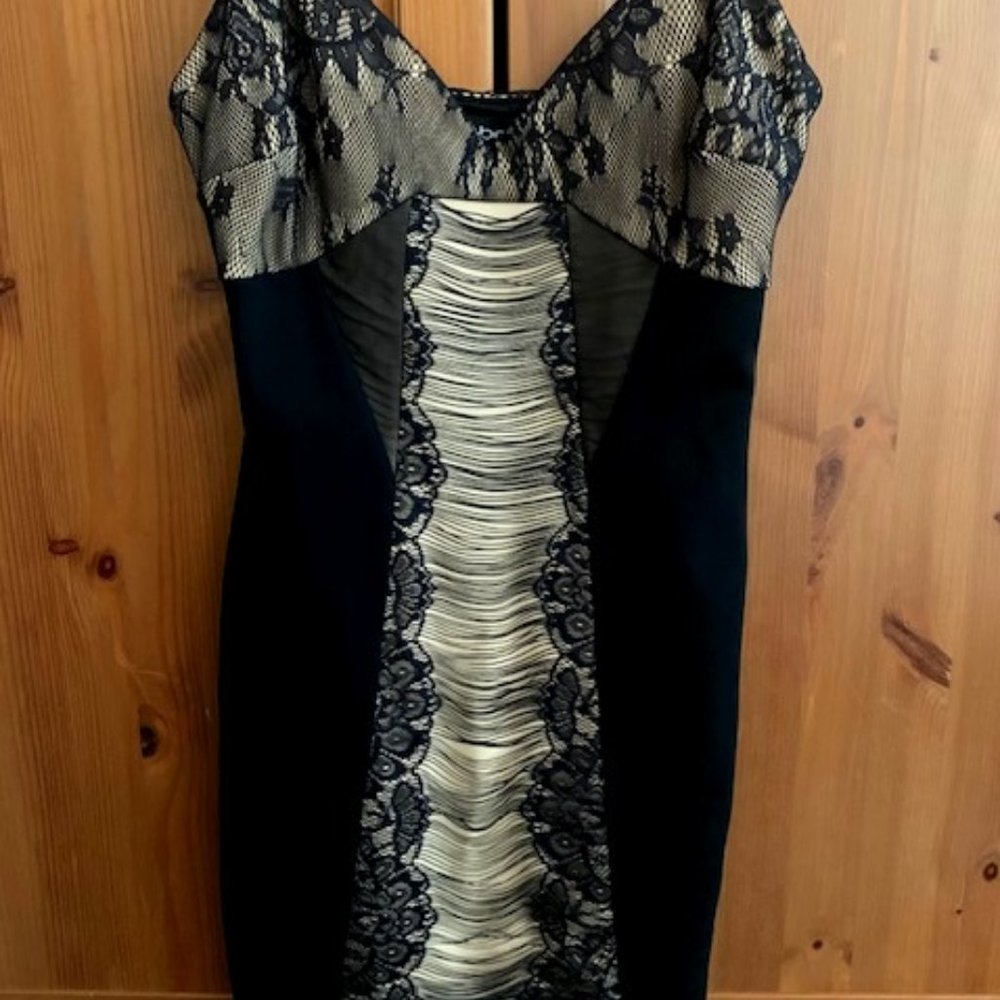 Bebe sexiest little black dress ever! size S